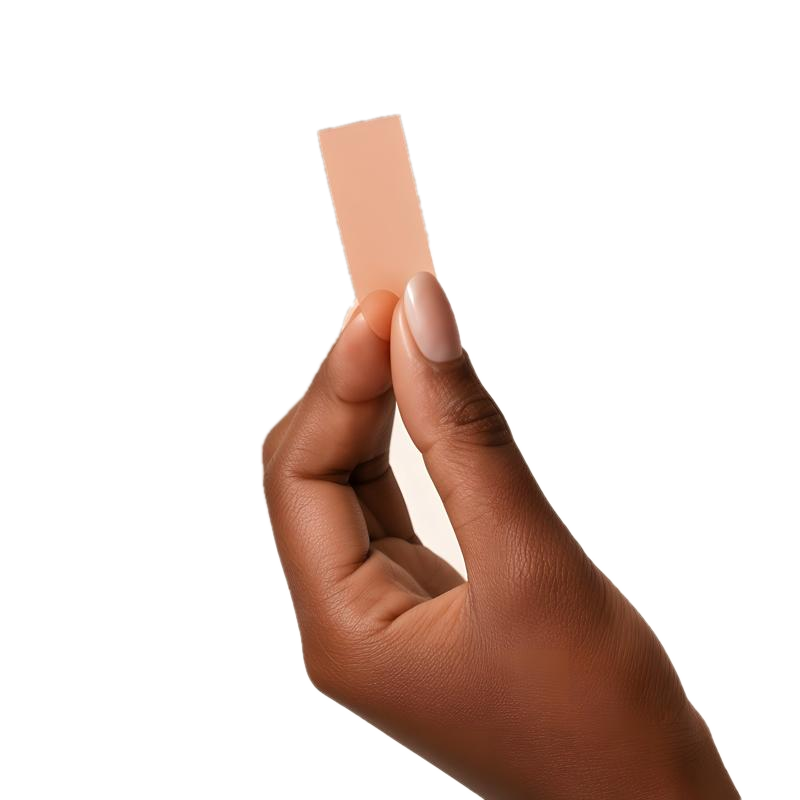 Hand holding a Happy Girl oral strip